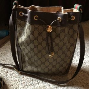 Gucci.  Crossover bag